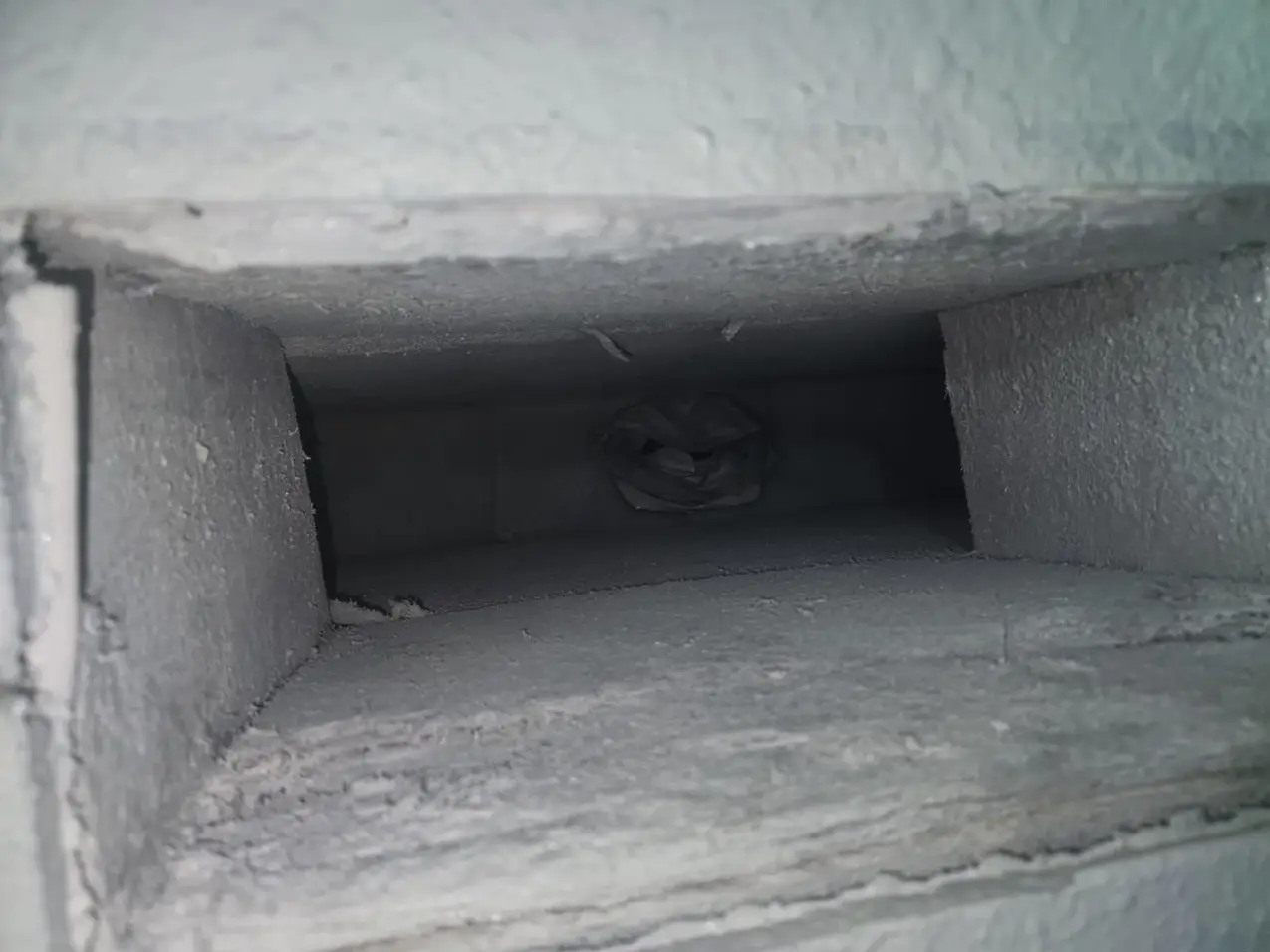 What Is Duct Leakage Testing, and When Is It Worth Scheduling? 2 duct openings and connections checked for leakage, real company service photo 3